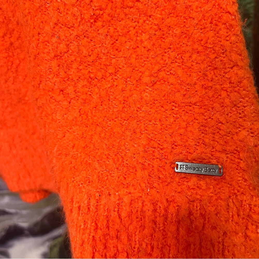 Sweaty Betty Orange Boucle Side Zip Turtleneck
Sweater - Picture 5 of 15